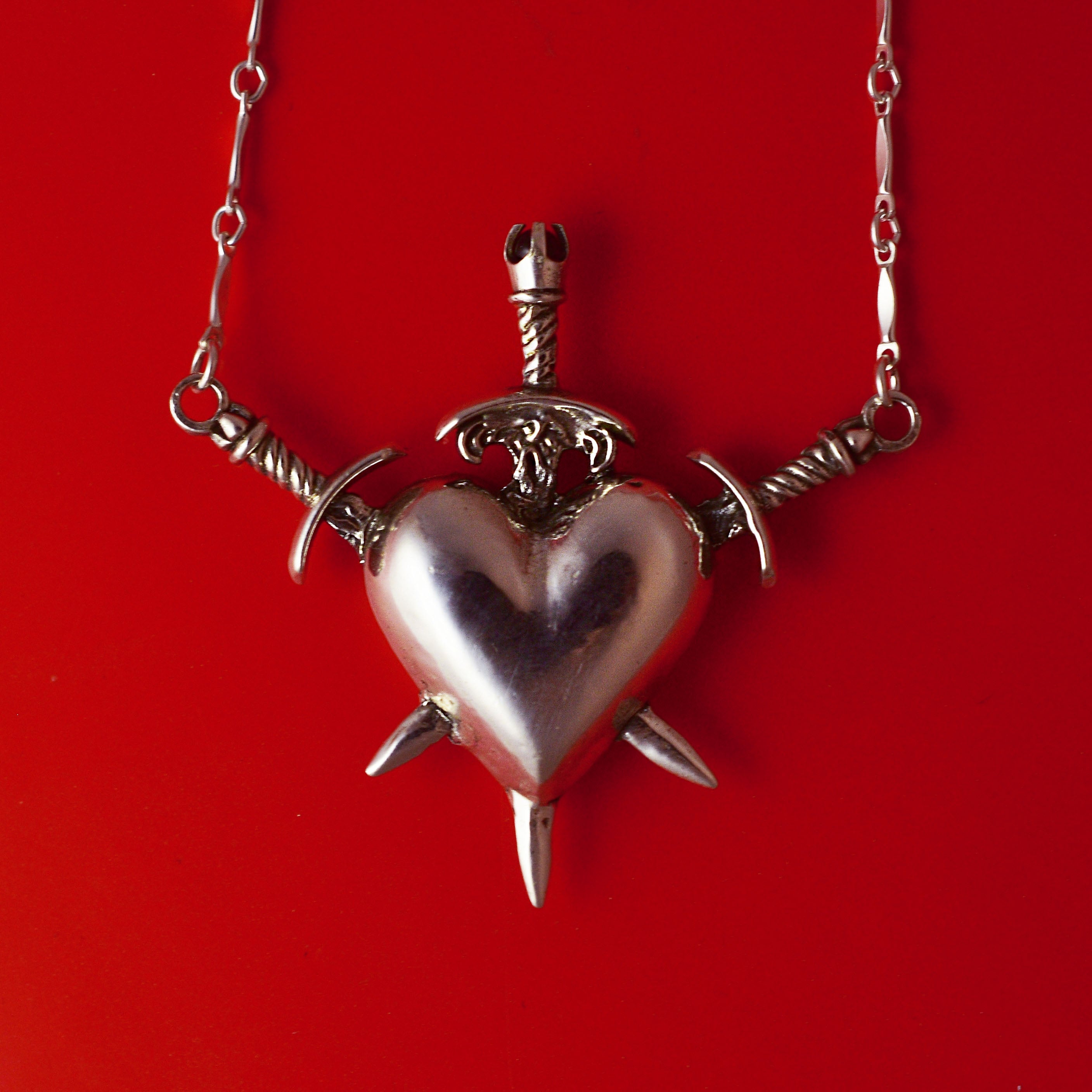 Three of Swords – OZMA adornments